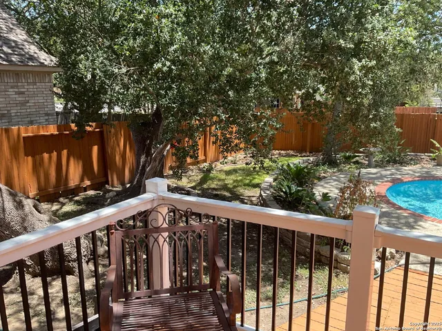 a view of a wooden fence