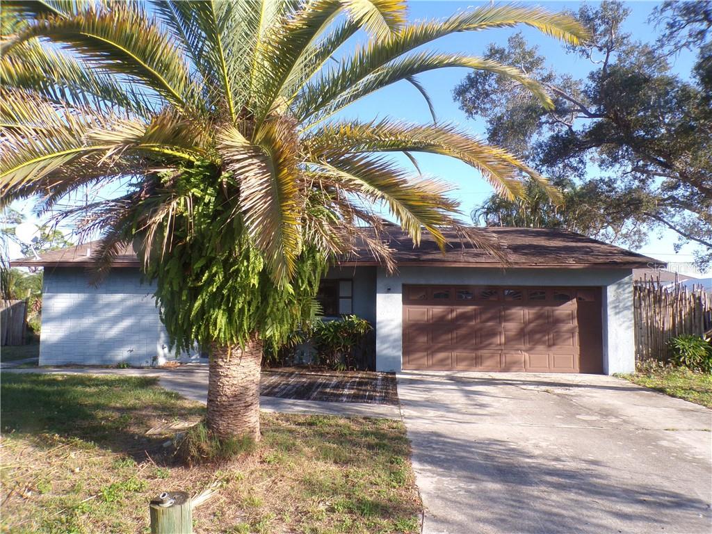 1239 Leeward Road Venice, FL 34293 - Photo 1 of 1 a front view of a house with garden