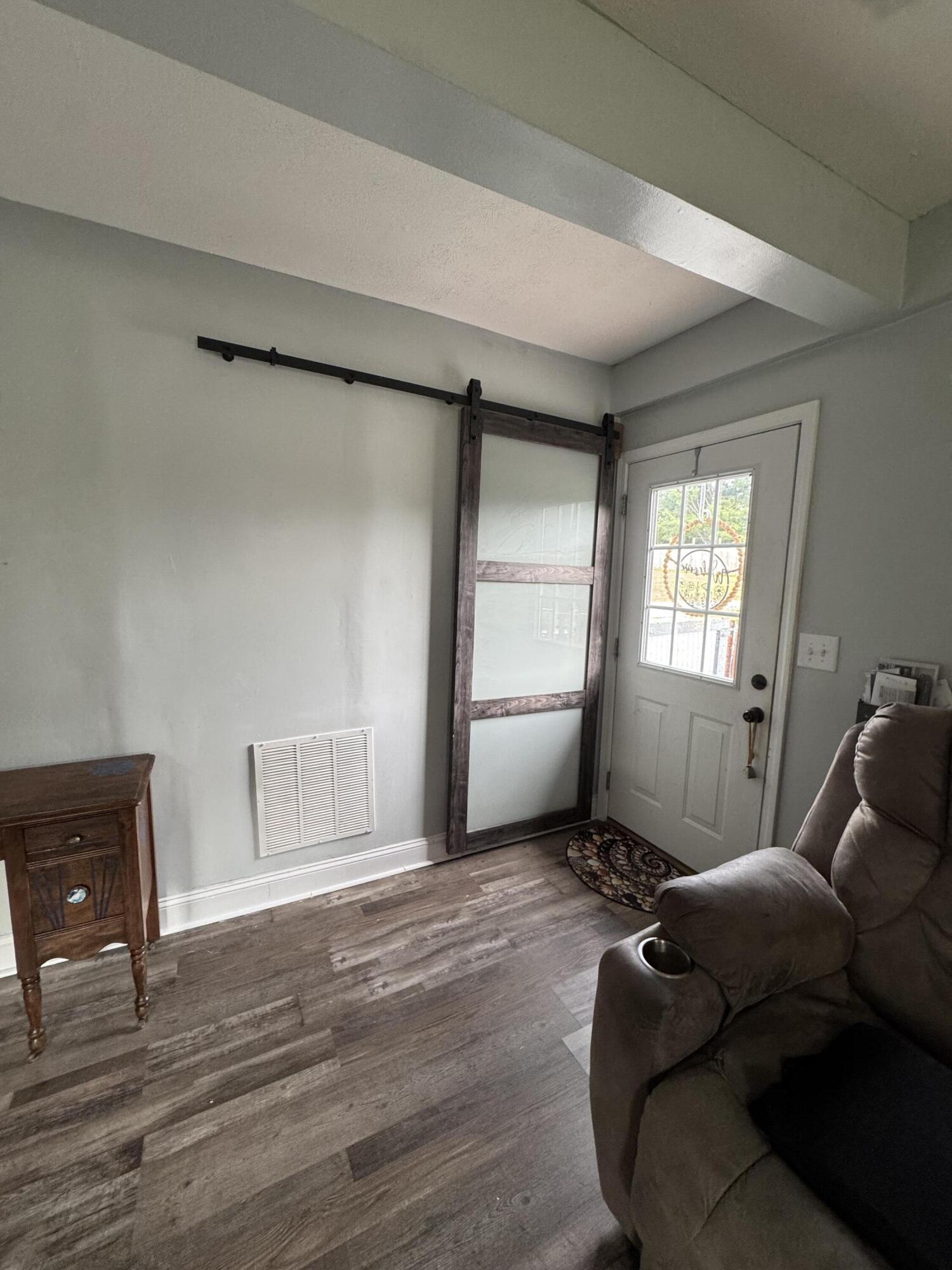 305 Glover Road Jamestown, KY 42629 - Photo 11 of 44 barn door that leads to spacious laundry room