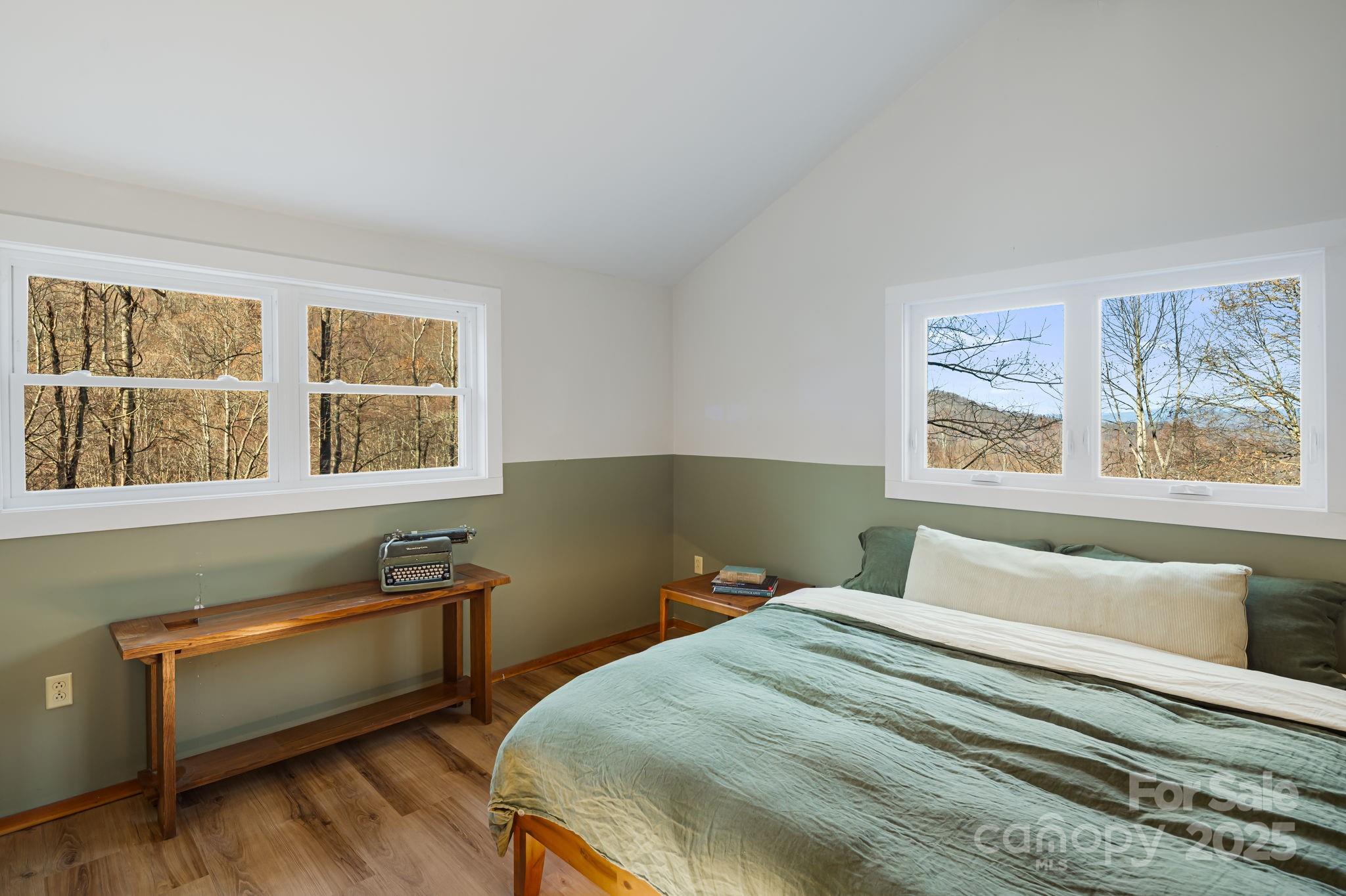 1877 Secluded Valley Road Marshall, NC 28753 - Photo 18 of 31 a bedroom with a bed and a window