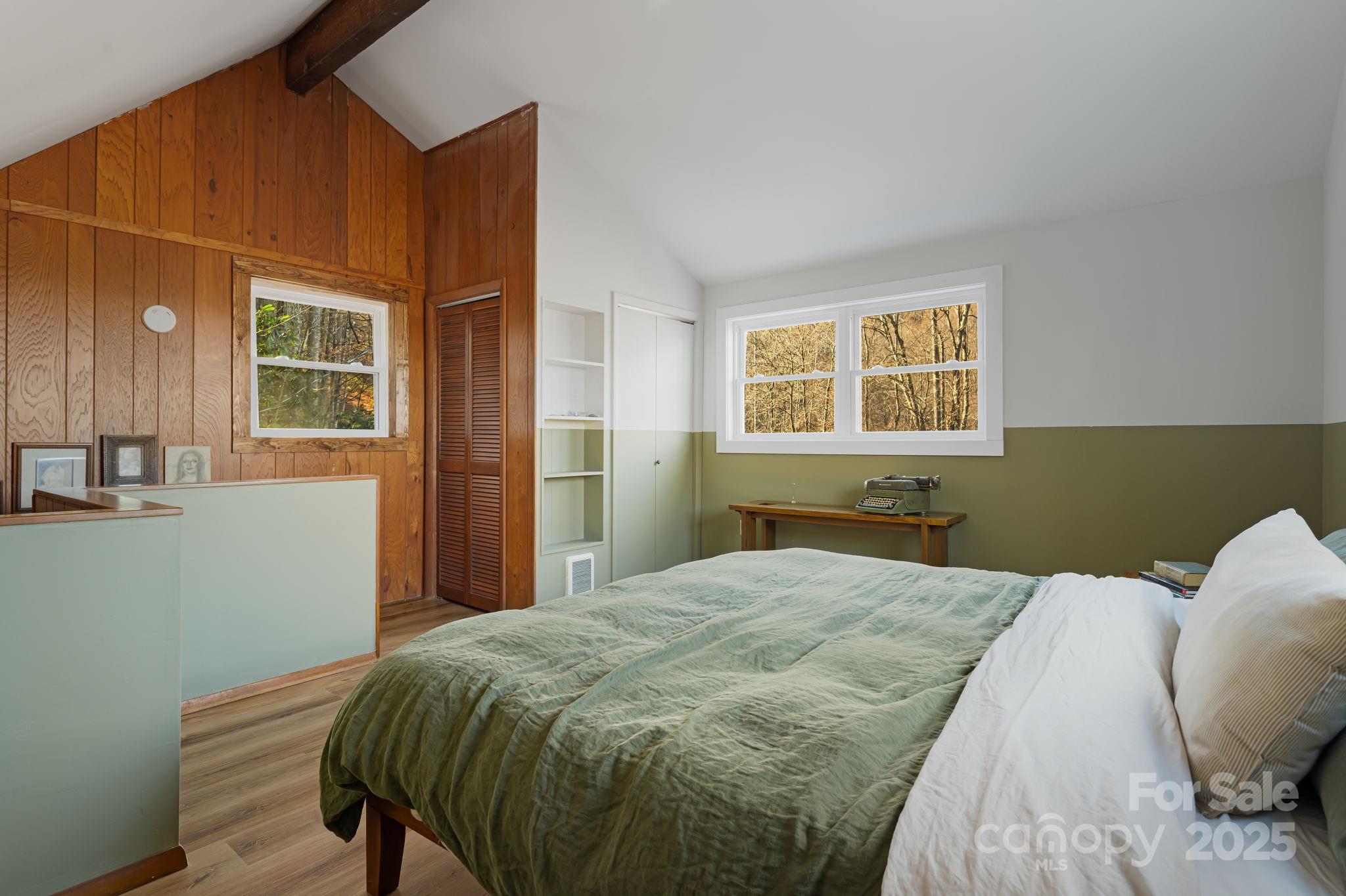 1877 Secluded Valley Road Marshall, NC 28753 - Photo 19 of 31 a bedroom with a bed and a window