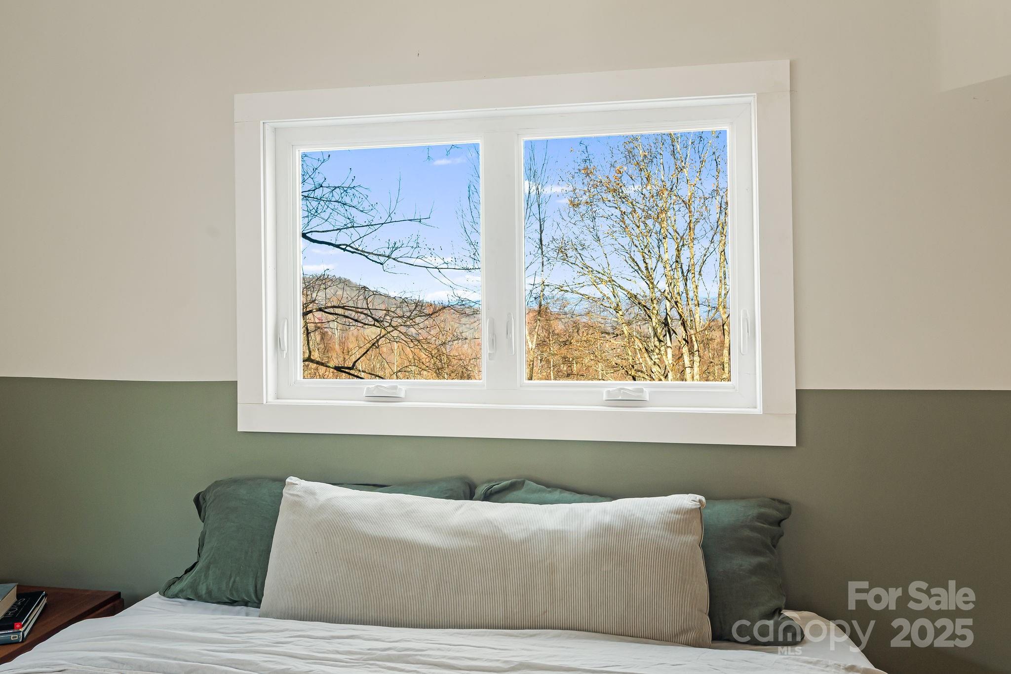1877 Secluded Valley Road Marshall, NC 28753 - Photo 20 of 31 a living room with furniture and a window