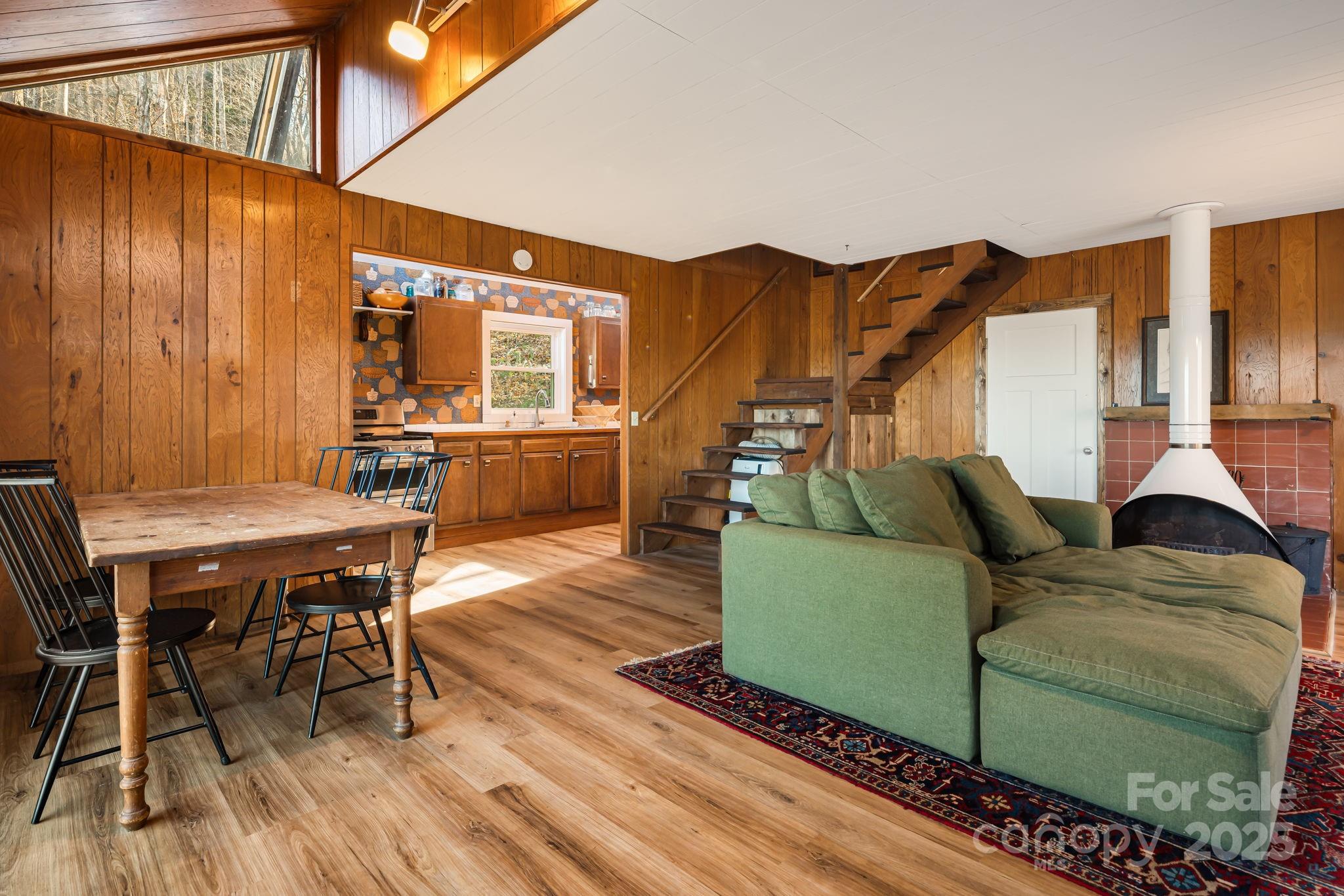1877 Secluded Valley Road Marshall, NC 28753 - Photo 8 of 31 a living room with furniture and wooden floor