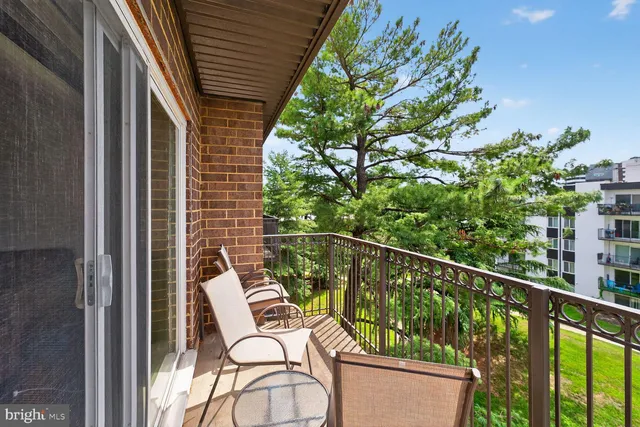 a balcony with wooden floor