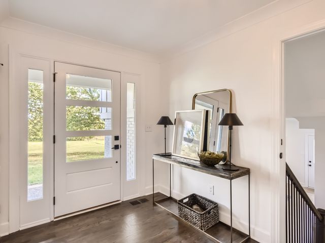 a room with gym equipment and a window