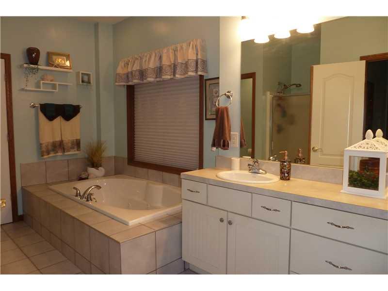 344 Cowpath Road Aliquippa, PA 15001 - Photo 14 of 25 Master Bath/Spa. Jet spray tub, and vanity area for two! The master suite adjoins the den area. Very private design for the master of the house!