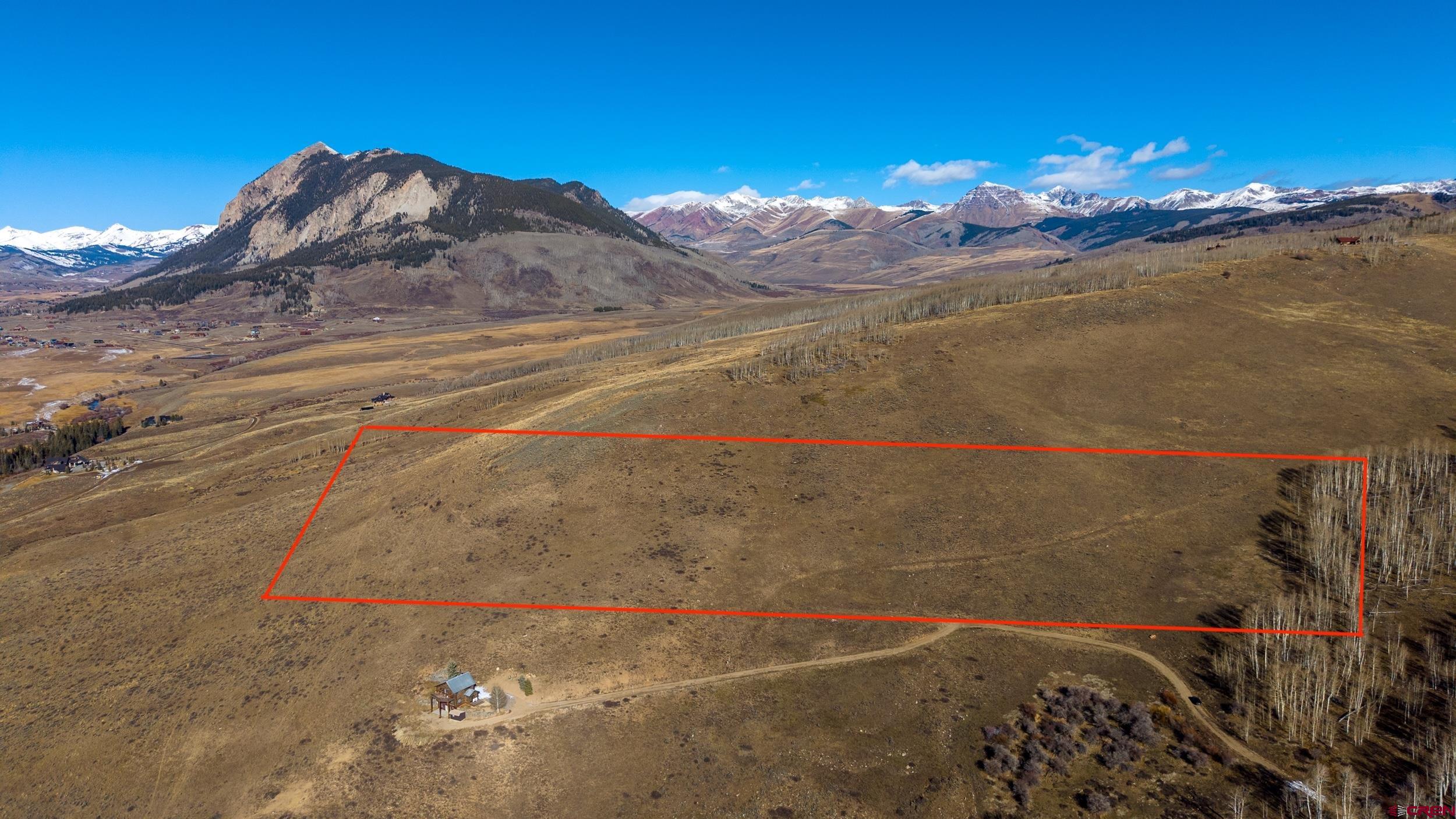 a view of a backyard of a house