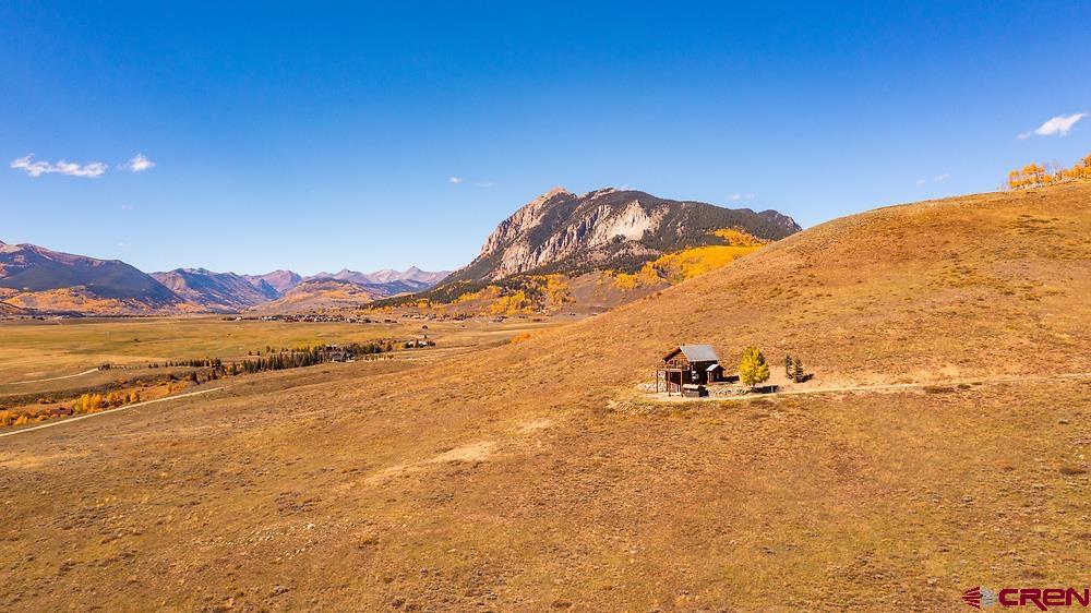 996 Lower Highlands Road Crested Butte, CO 81224 - Photo 11 of 20 a view of an ocean and a mountain