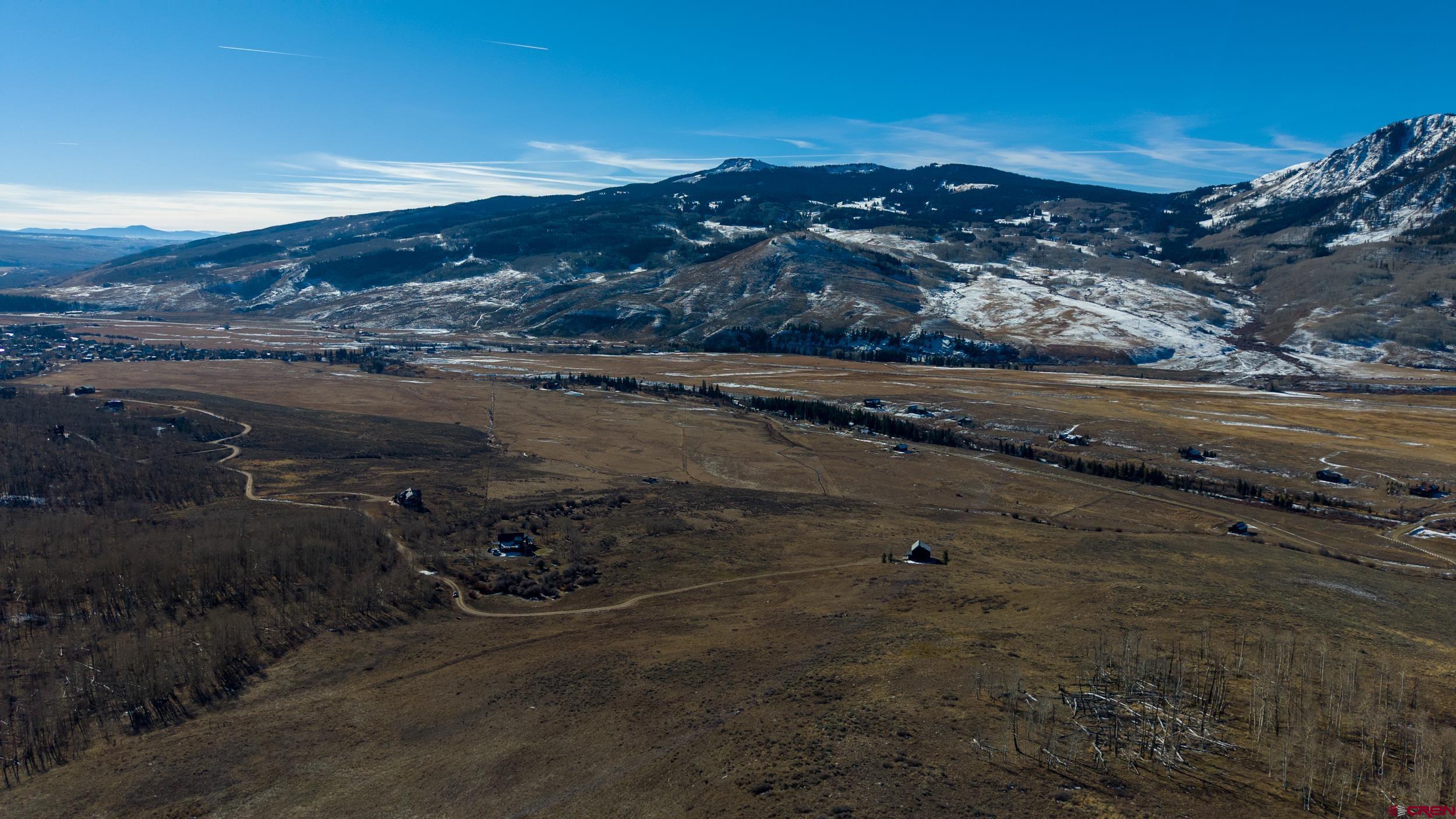 996 Lower Highlands Road Crested Butte, CO 81224 - Photo 19 of 20 a view of a lake view and mountain view