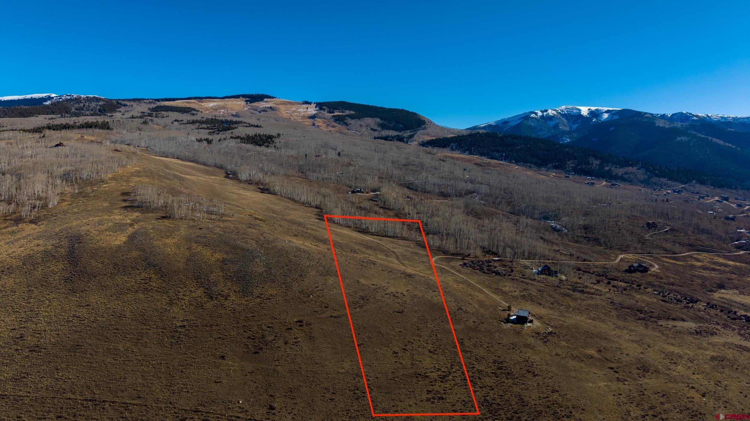 996 Lower Highlands Road Crested Butte, CO 81224 - Photo 3 of 20 a view of mountains in the background