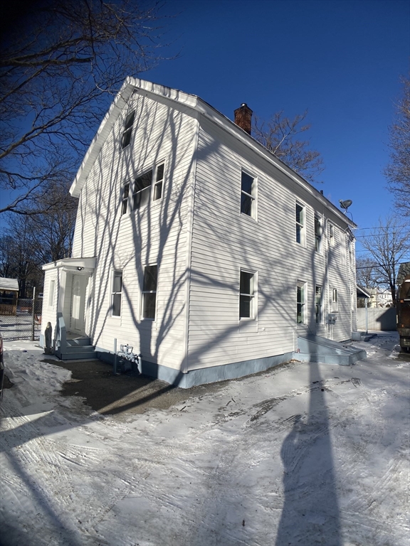 9 Pleasant Terrace Worcester, MA 01609 - Photo 1 of 27 a view of a house with a yard