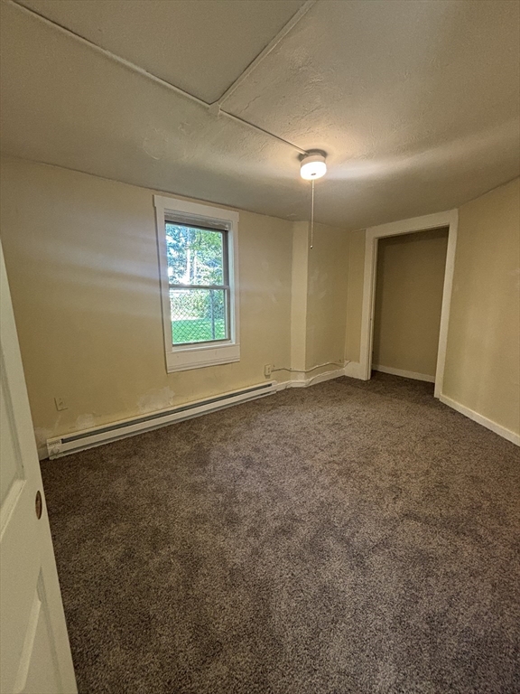 9 Pleasant Terrace Worcester, MA 01609 - Photo 12 of 27 an empty room with windows