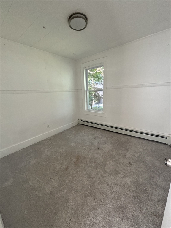 9 Pleasant Terrace Worcester, MA 01609 - Photo 18 of 27 an empty room with a empty space and a window