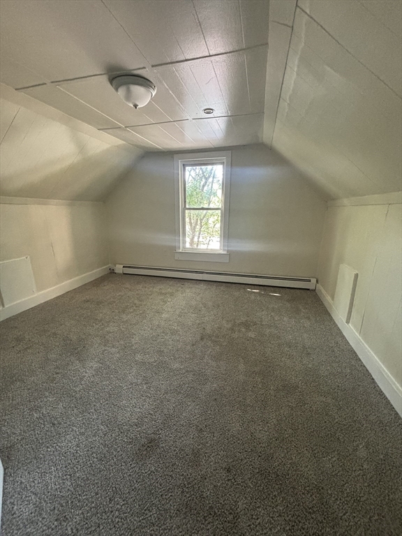 9 Pleasant Terrace Worcester, MA 01609 - Photo 22 of 27 an empty room with a empty space and windows