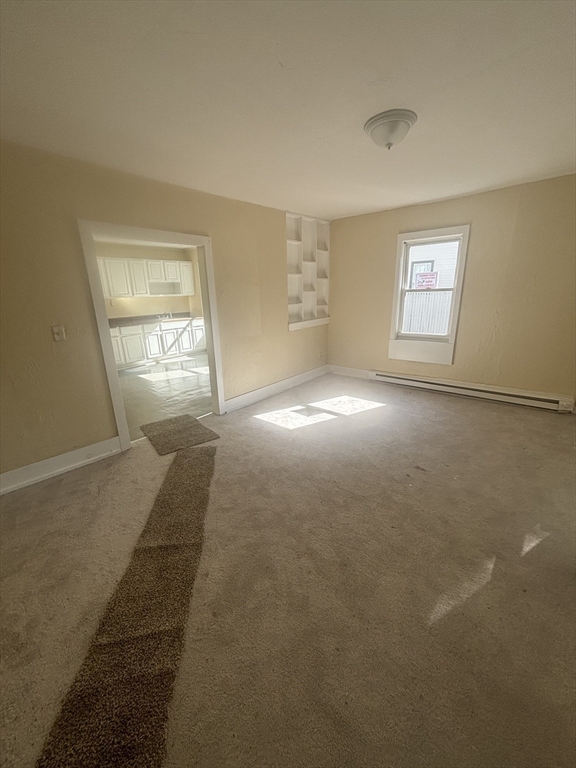 9 Pleasant Terrace Worcester, MA 01609 - Photo 7 of 27 an empty room with windows