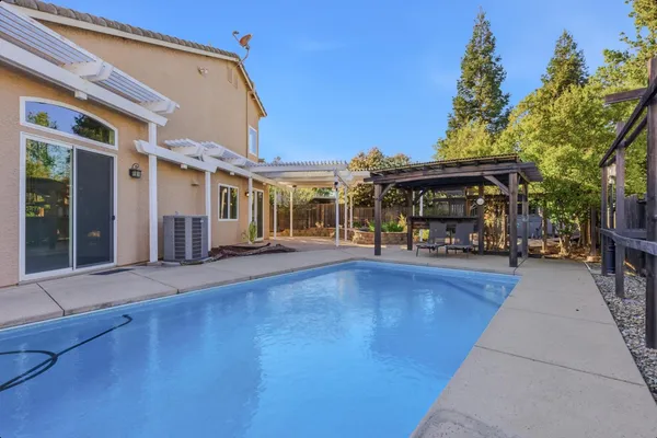 a view of a building with sitting area