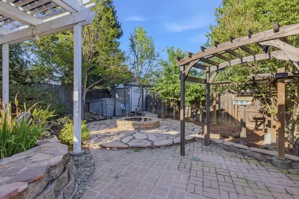 a view of yard with patio