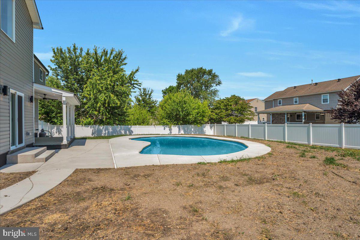 2504 Church Road Cinnaminson, NJ 08077 - Photo 59 of 79 a view of a swimming pool with an outdoor space