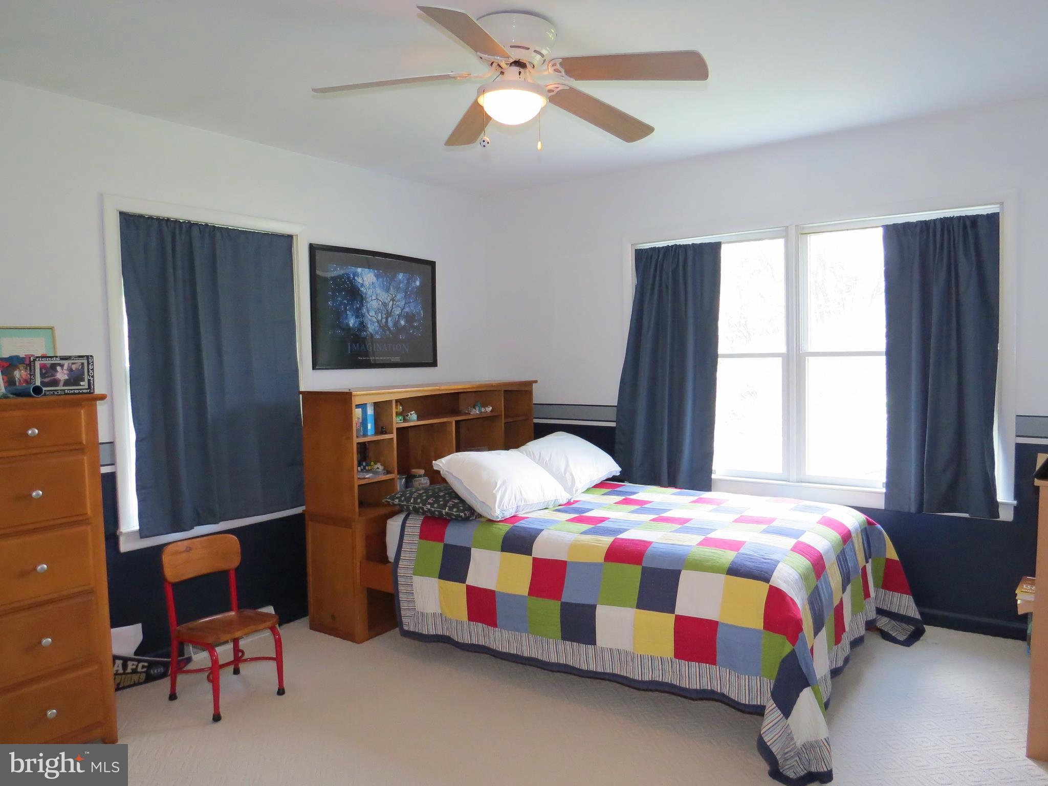 3165 Falls Road Hampstead, MD 21074 - Photo 14 of 30 a bedroom with a bed and a window