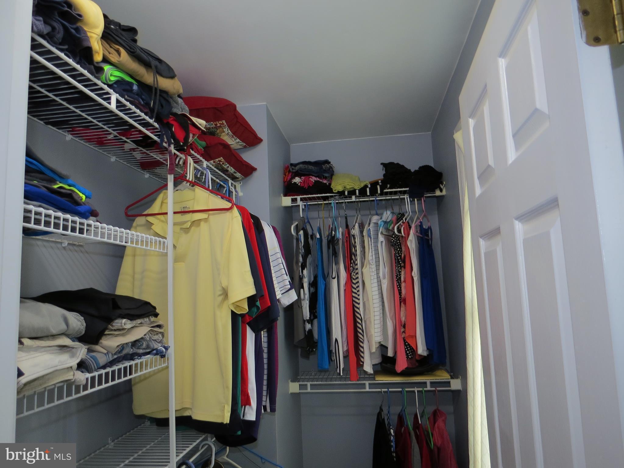 3165 Falls Road Hampstead, MD 21074 - Photo 20 of 30 a view of walk in closet with clothes and shoes