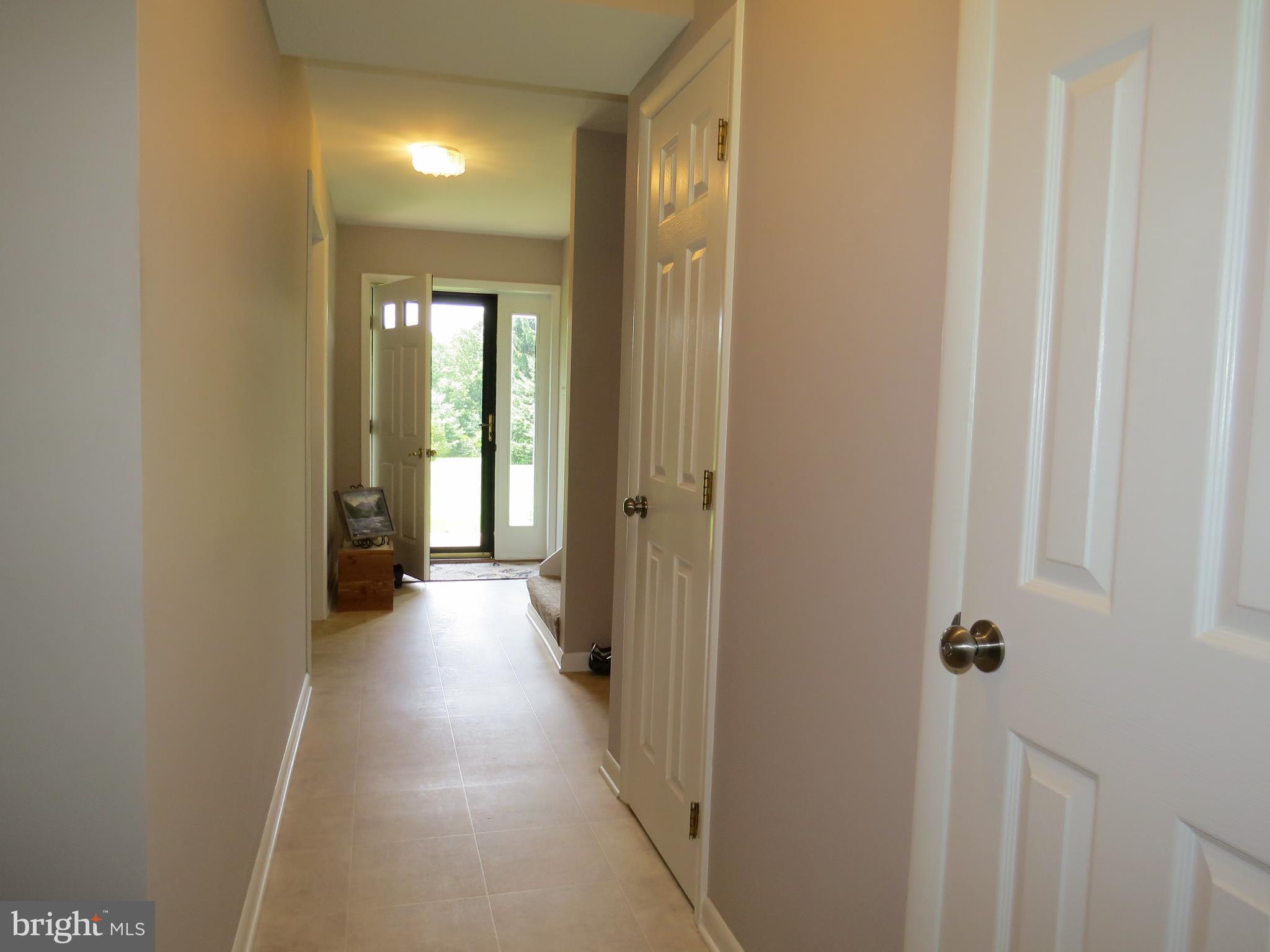 3165 Falls Road Hampstead, MD 21074 - Photo 21 of 30 a view of a hallway with wooden floor