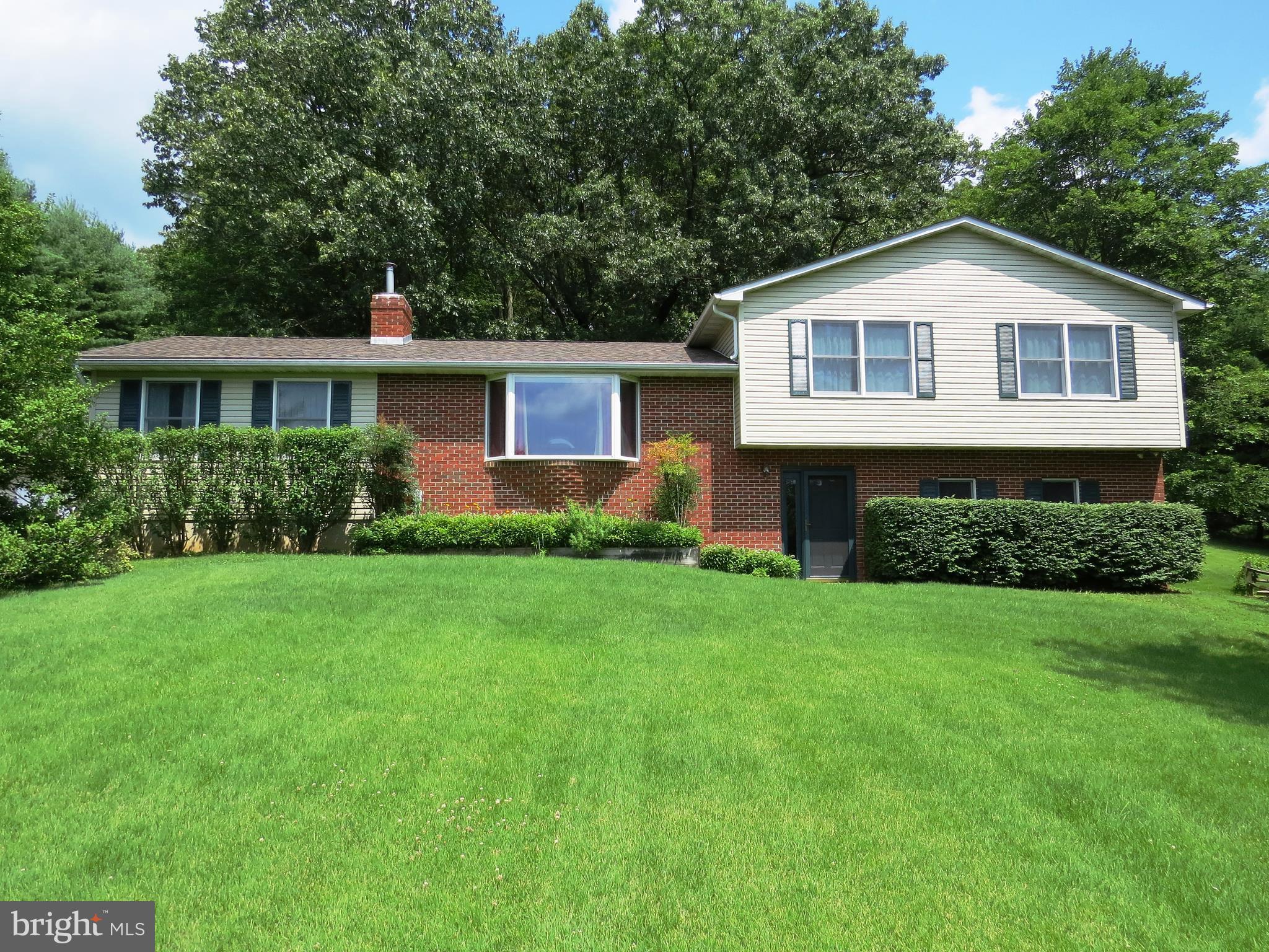 3165 Falls Road Hampstead, MD 21074 - Photo 30 of 30 a front view of house with yard and green space