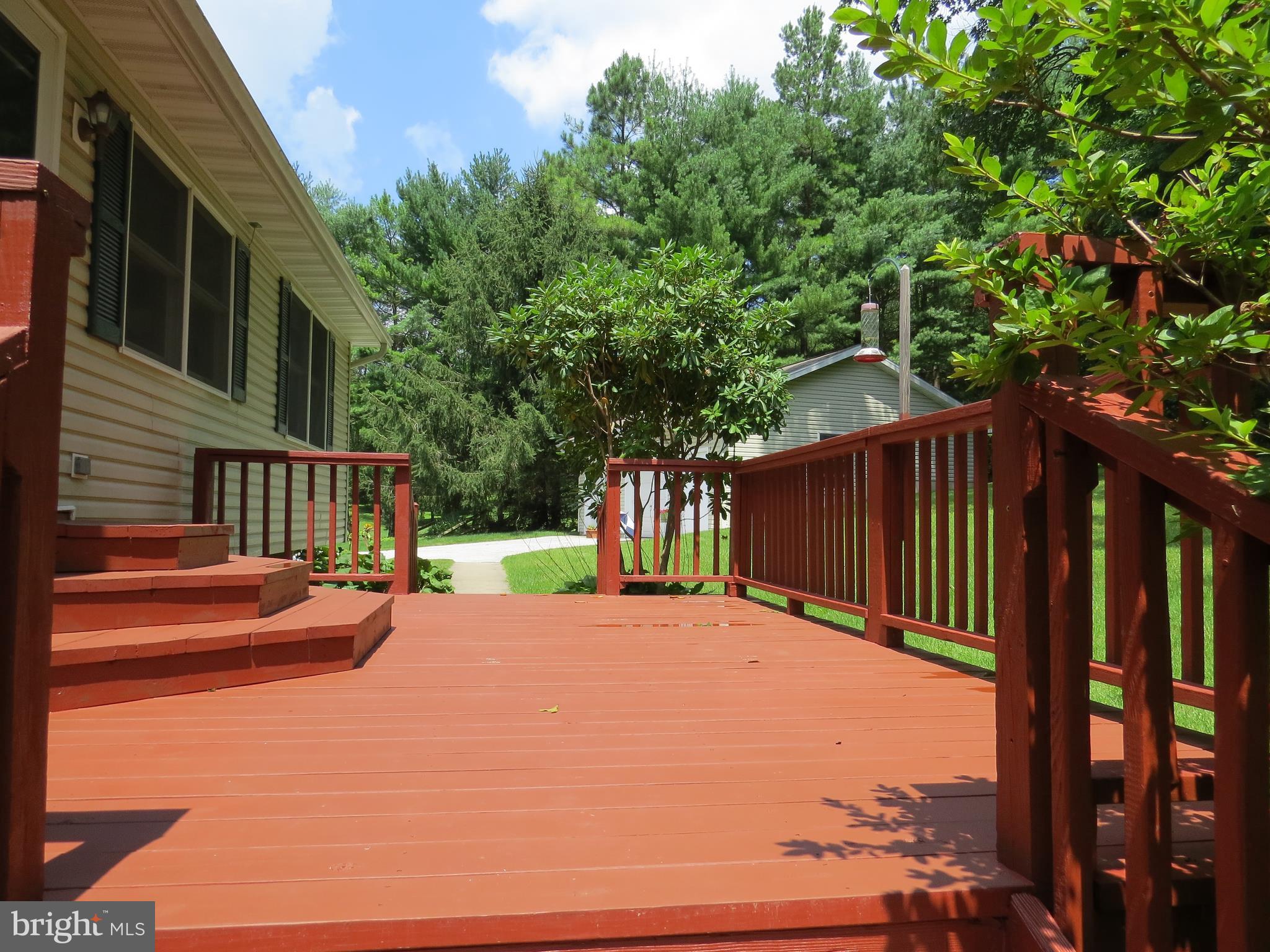 3165 Falls Road Hampstead, MD 21074 - Photo 9 of 30 a view of a house with backyard and deck