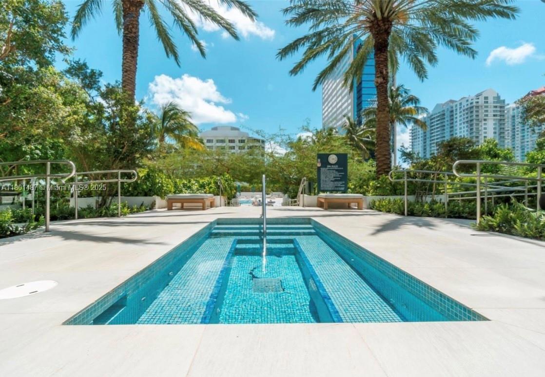 950 Brickell Bay Drive, Unit 401 Miami, FL 33131 - Photo 19 of 28 a picture of palm trees