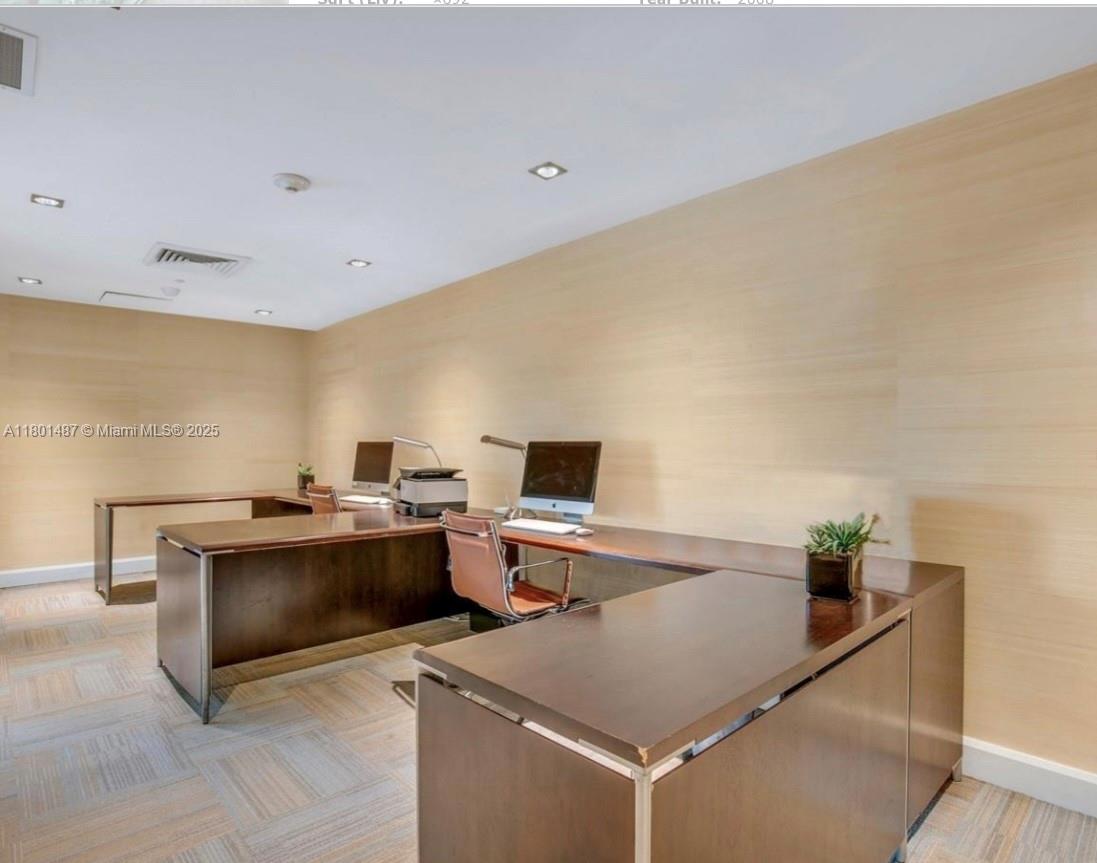 950 Brickell Bay Drive, Unit 401 Miami, FL 33131 - Photo 25 of 28 a room with furniture and window