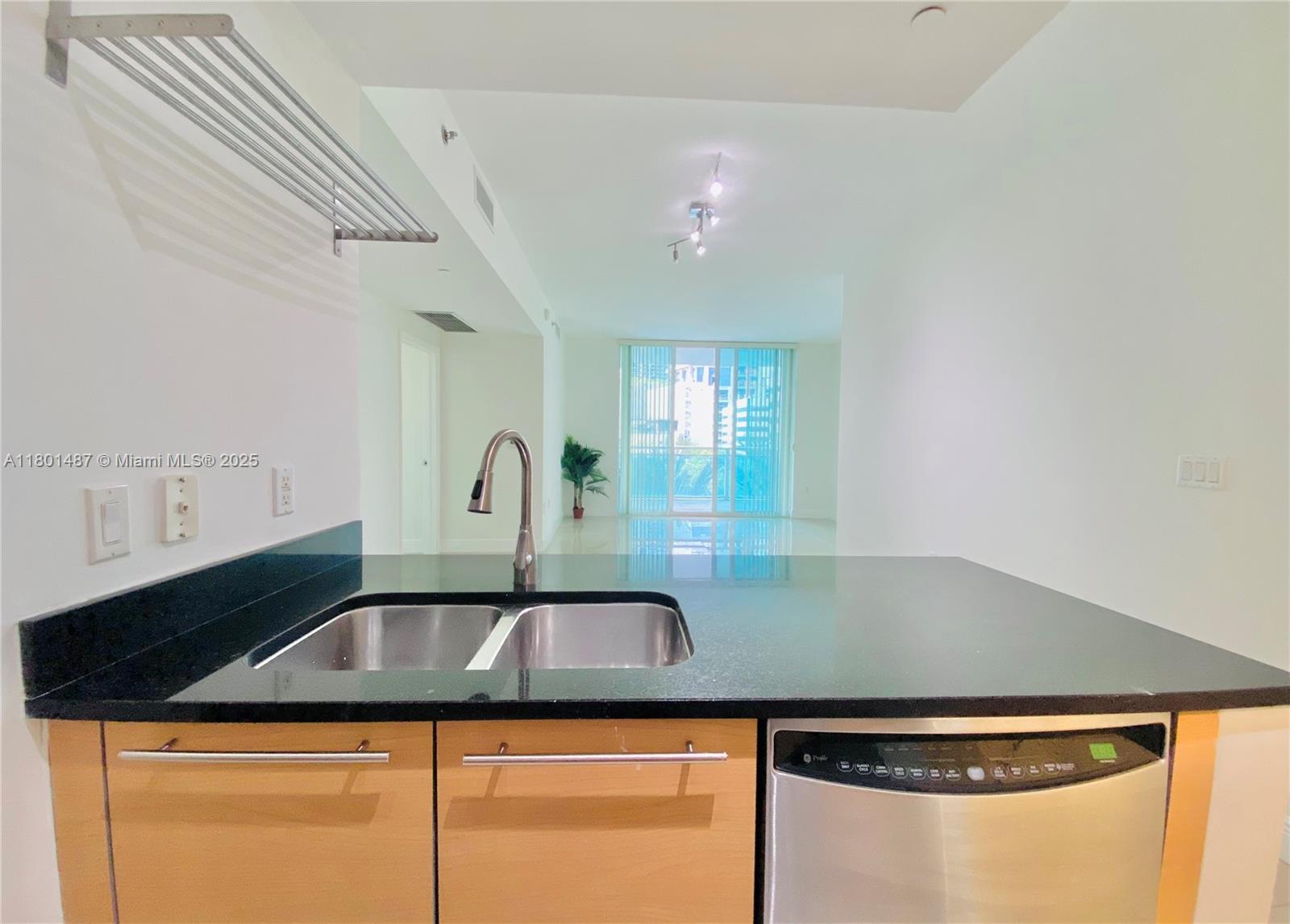 950 Brickell Bay Drive, Unit 401 Miami, FL 33131 - Photo 4 of 28 a close view of sink and tap