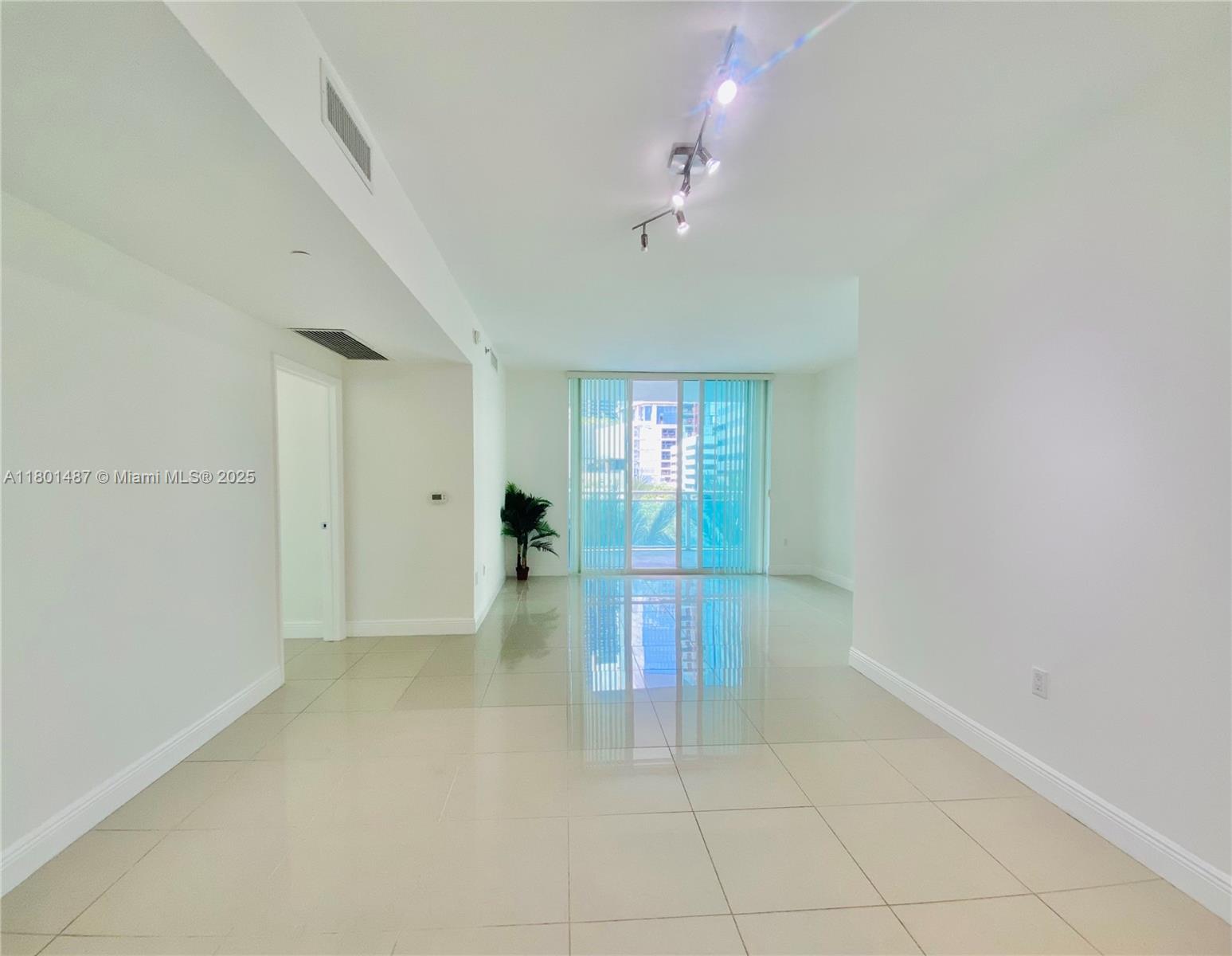 950 Brickell Bay Drive, Unit 401 Miami, FL 33131 - Photo 7 of 28 a view of livingroom with furniture