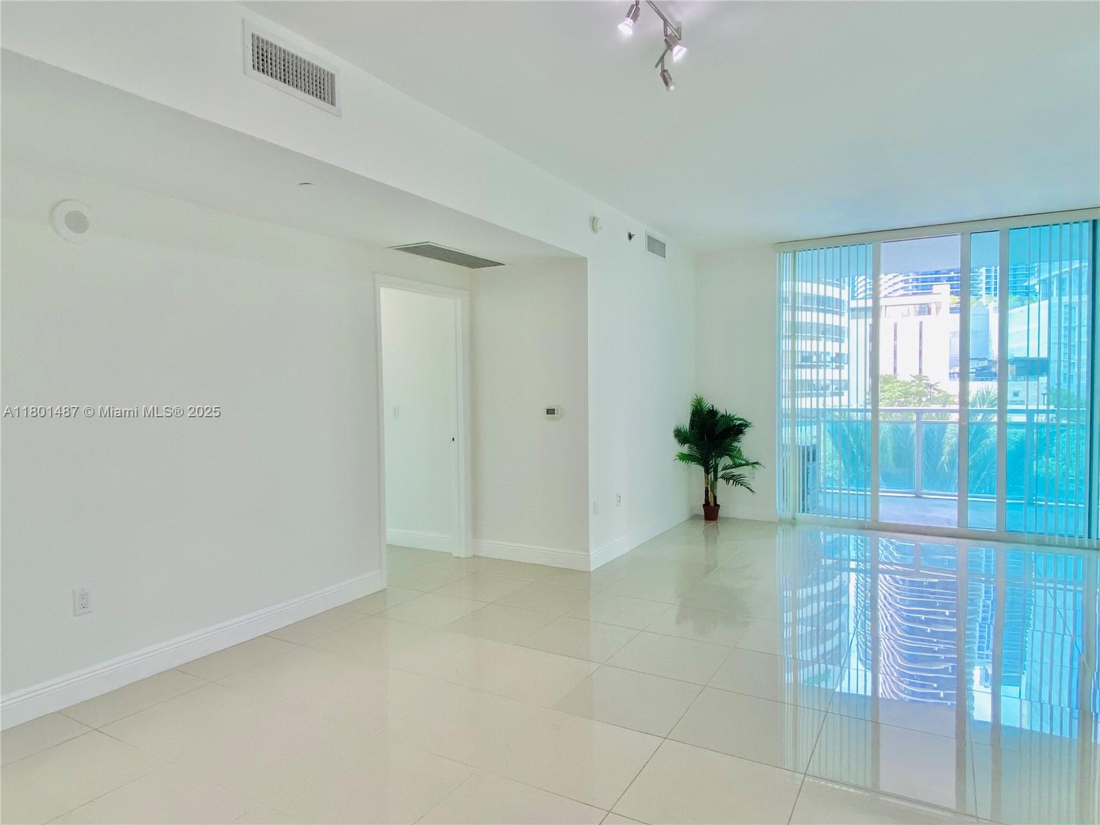 950 Brickell Bay Drive, Unit 401 Miami, FL 33131 - Photo 8 of 28 a view of a interior of the room