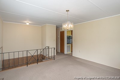 1012 Asbury Road Eastover, NC 28312 - Photo 5 of 38 a view of a hallway with an empty space