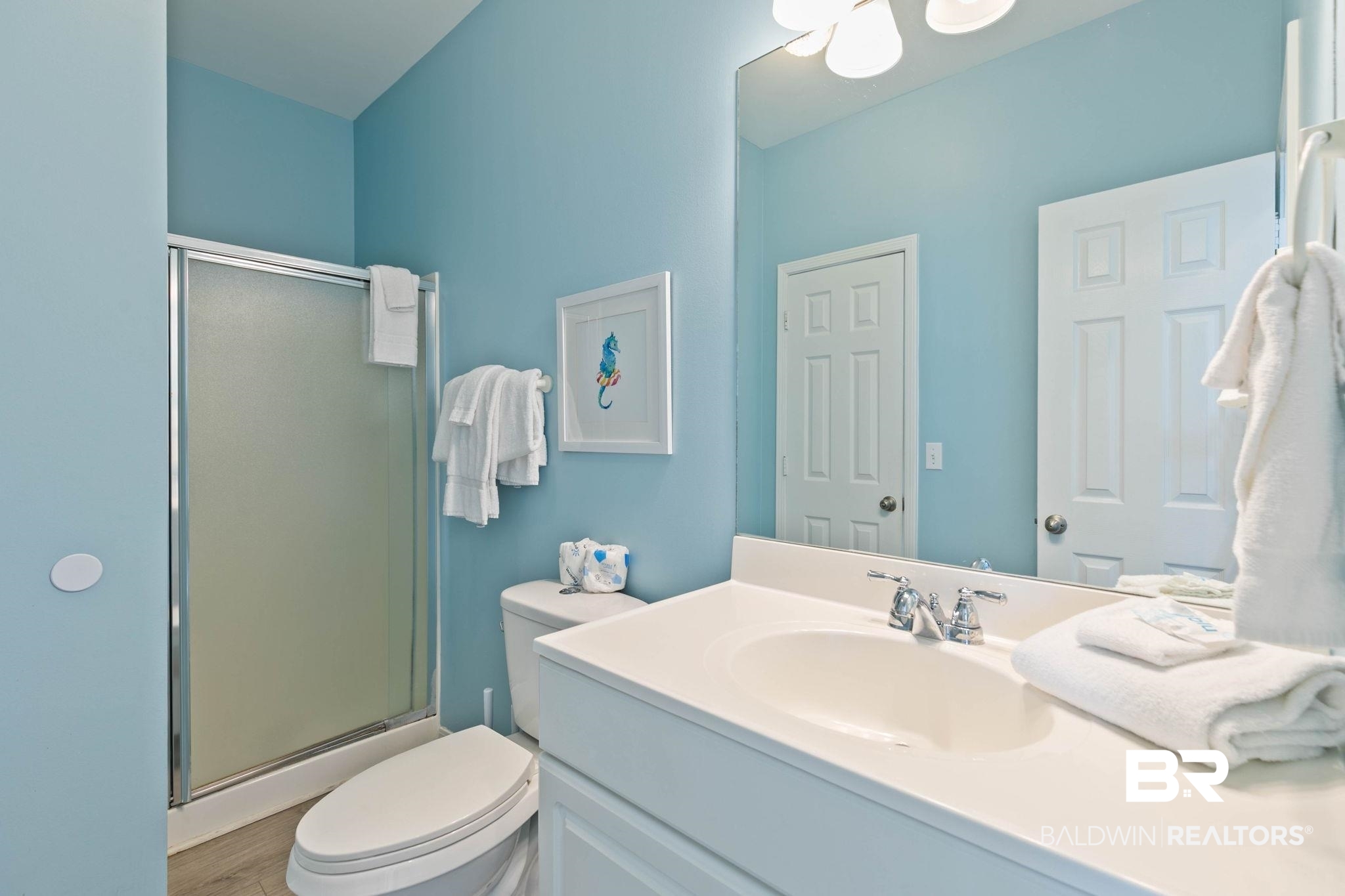 545 Plantation Road, Unit 3 Gulf Shores, AL 36542 - Photo 22 of 54 Bathroom with a stall shower and vanity