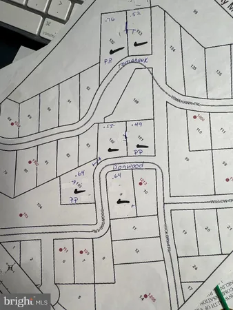 a view of a utility room with racks on the wall