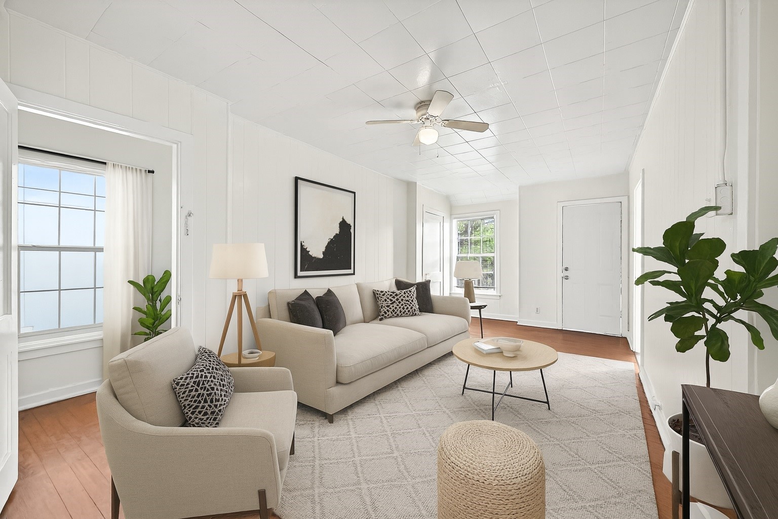 4212 Woodhead Street, Unit 2 Houston, TX 77098 - Photo 1 of 26 a living room with furniture