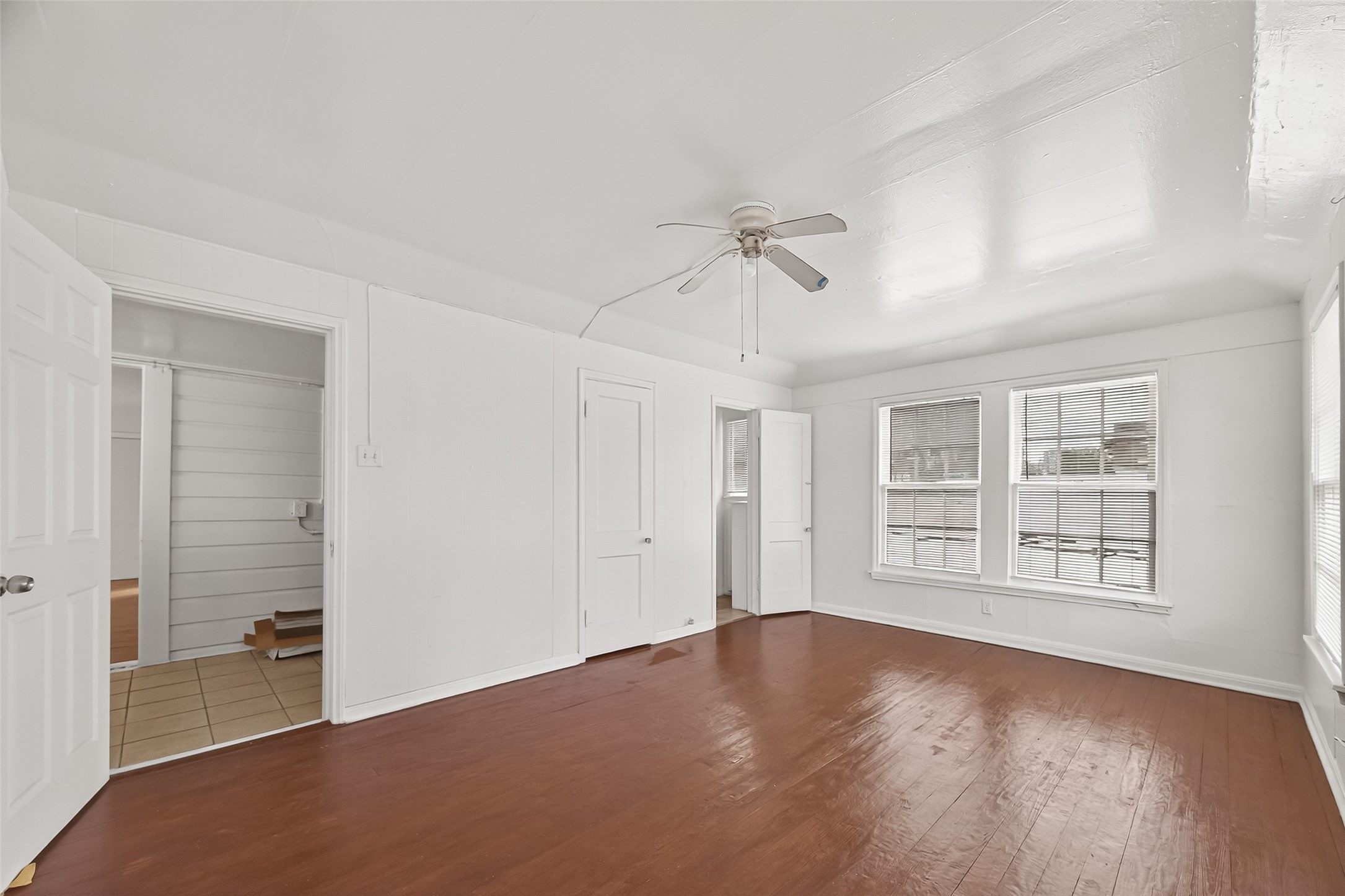4212 Woodhead Street, Unit 2 Houston, TX 77098 - Photo 16 of 26 wooden floor in an empty room with a window