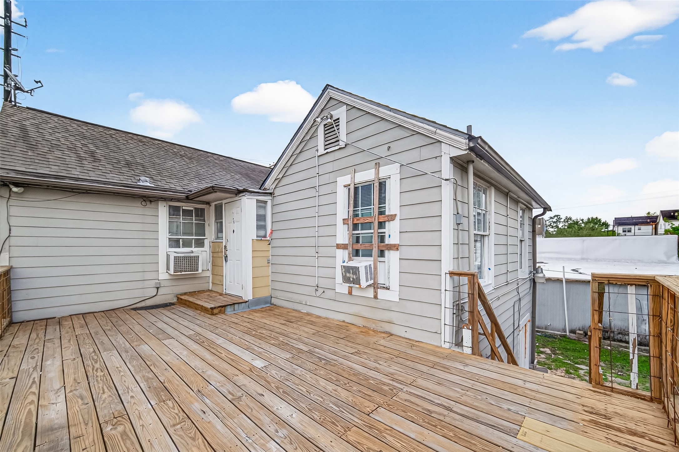 4212 Woodhead Street, Unit 2 Houston, TX 77098 - Photo 26 of 26 a view of a house with a deck