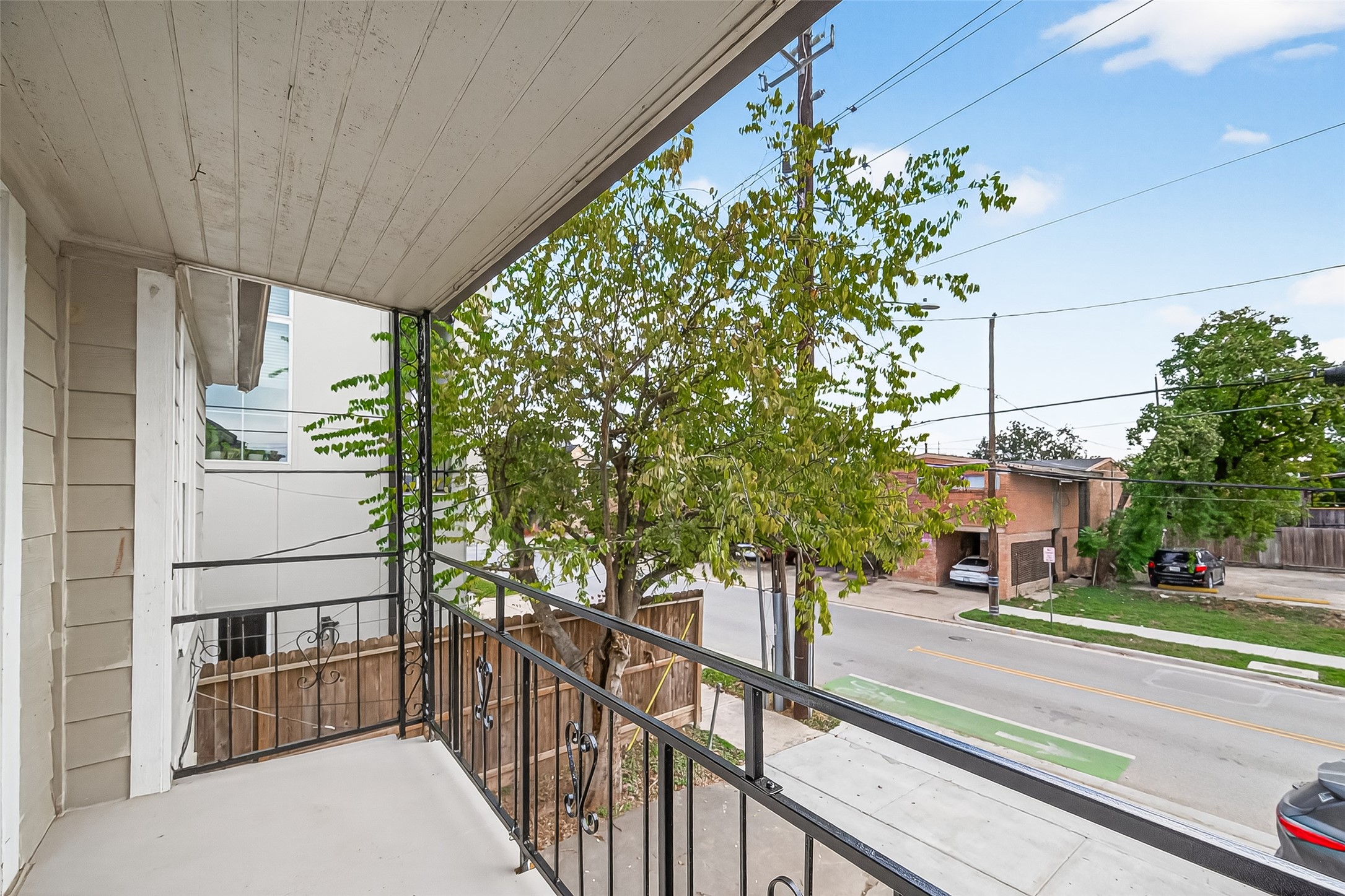 4212 Woodhead Street, Unit 2 Houston, TX 77098 - Photo 5 of 26 a view of a street from a balcony