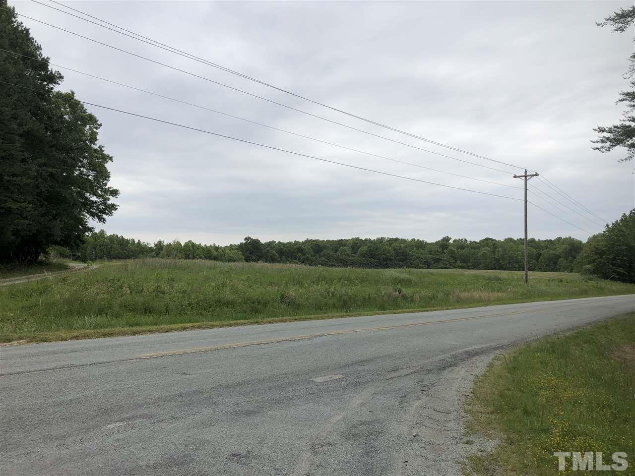 8600 McKee Road Rougemont, NC 27572 - Photo 3 of 11 a view of a field with an trees
