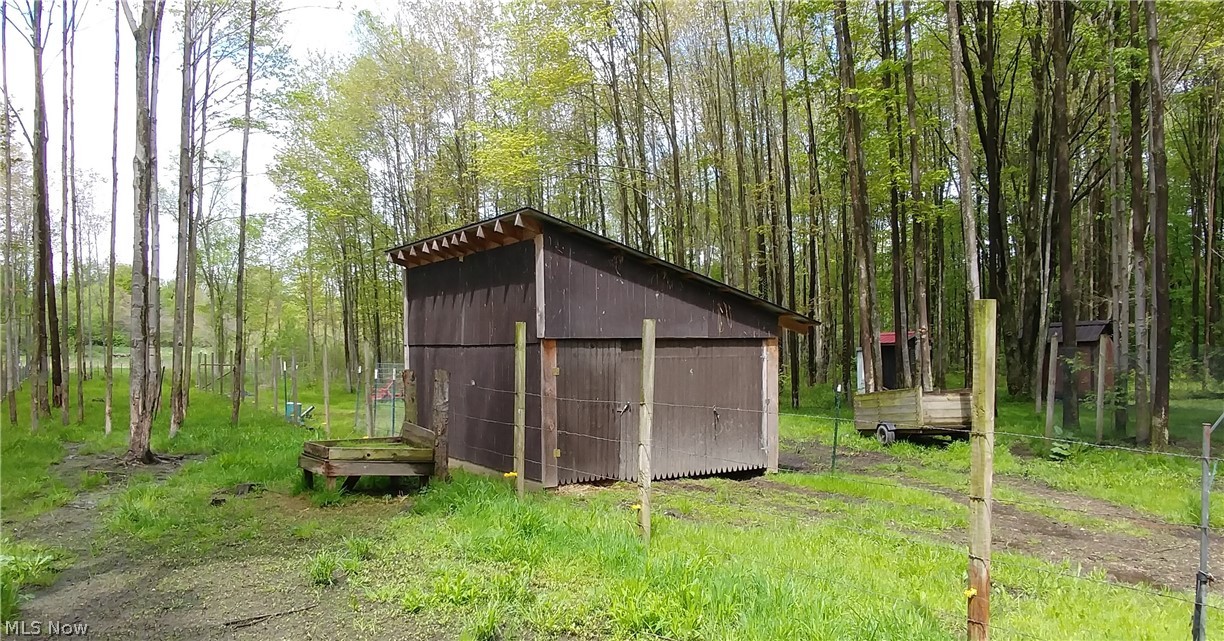 3948 Ayers Road Dorset, OH 44032 - Photo 20 of 20 Tractor or implement shed. Cedar sided.