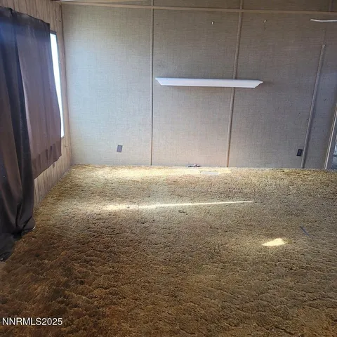 a view of empty room with window