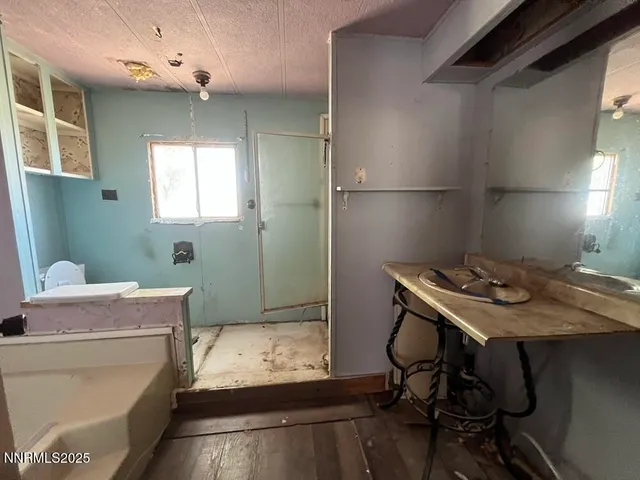 a bathroom with a sink toilet and vanity