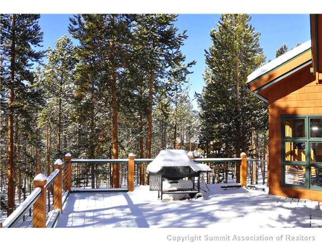 1631 Keystone Ranch Road Keystone, CO 80435 - Photo 22 of 25 a view of a chairs and table in the patio