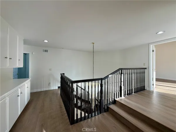 a view of a hallway with closet