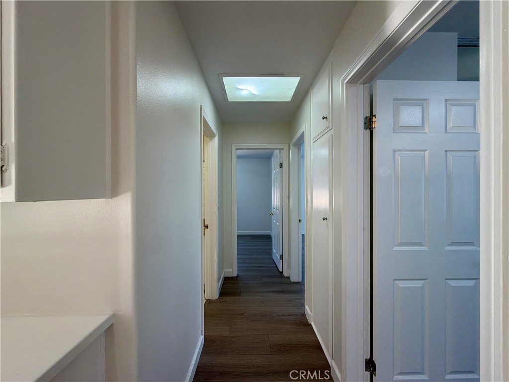 11932 Sonoma Way Porter Ranch, CA 91326 - Photo 42 of 63 a view of a hallway with wooden floor