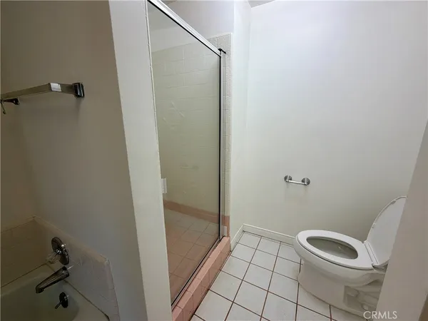 a view of a swimming pool with a yard