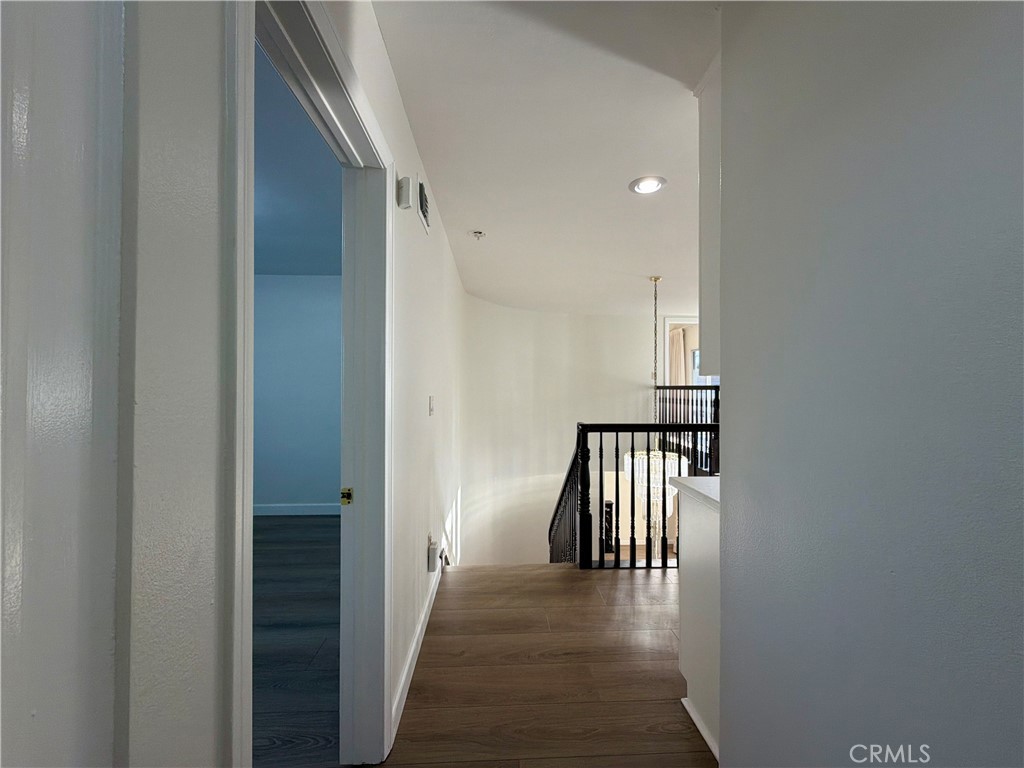 11932 Sonoma Way Porter Ranch, CA 91326 - Photo 54 of 63 a view of hallway with wooden floor