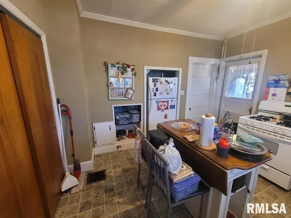 a room with furniture and wooden floor