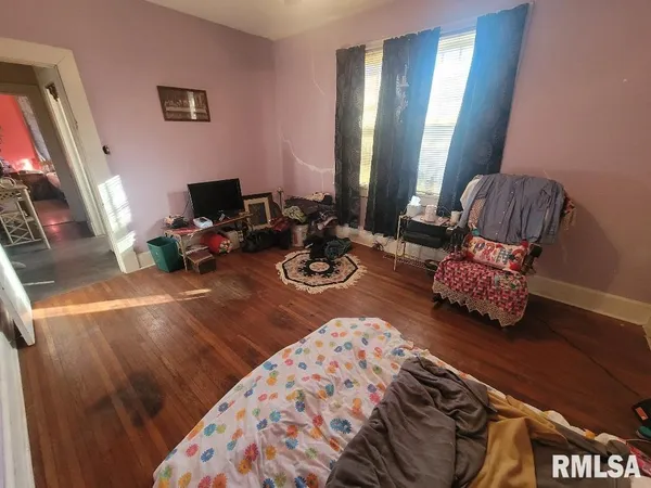 a view of a livingroom with furniture and a couch